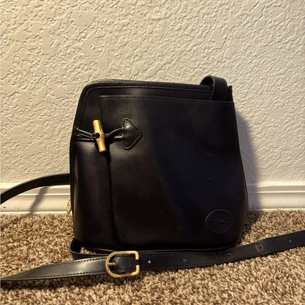 Longchamp black crossbody bag with gold accents - in excellent condition!